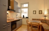 Küche mit gemütlichem Esstisch und Sitzecke, Ferienwohnung 1, Gästehaus Altstadt